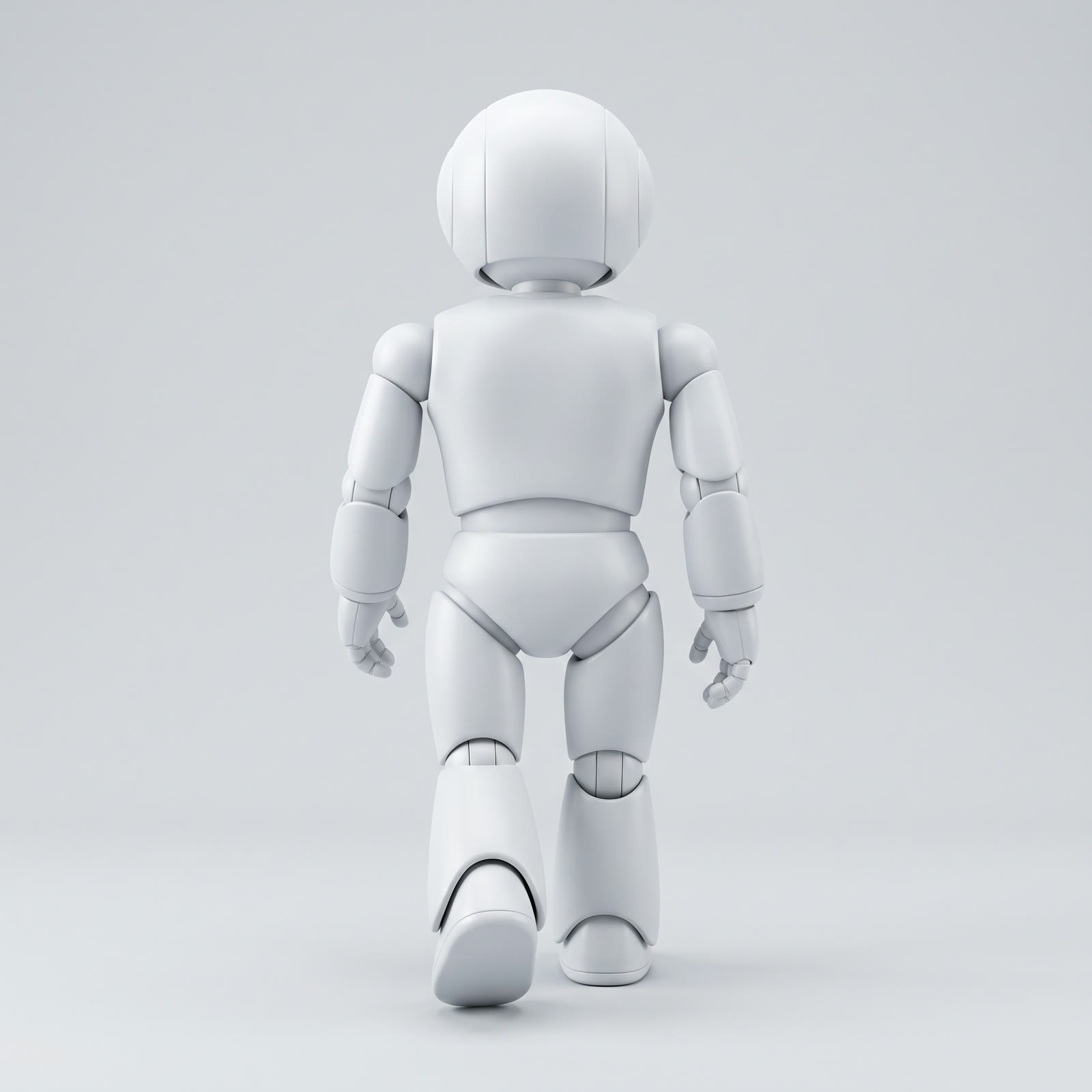 A white humanoid robot seen from behind, mid-stride, on a light gray background