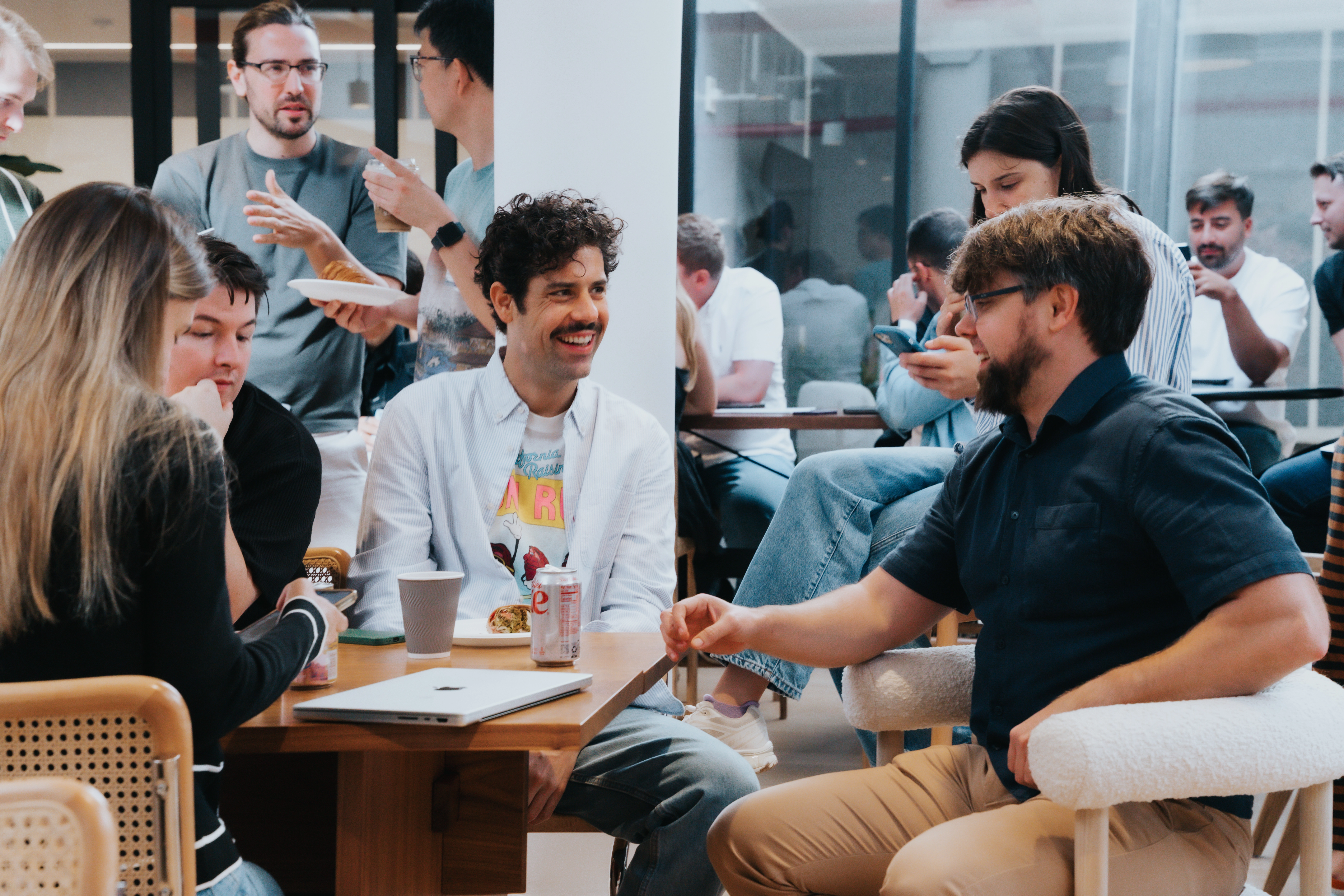 Two members of the Runway creative team setting up the creative studio area.